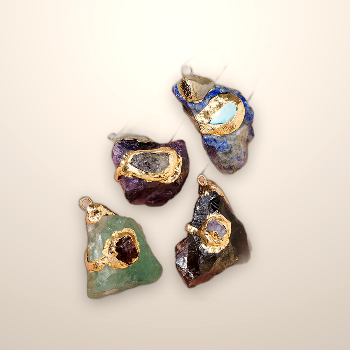 Raw crystal pendant on a gold-tone setting